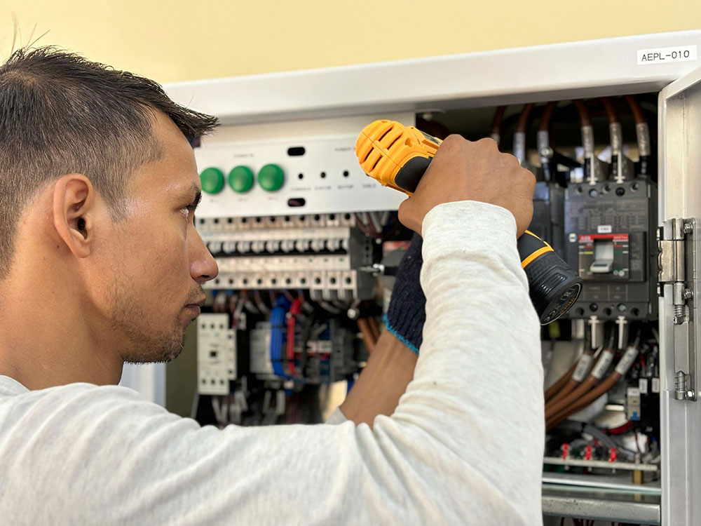 Electrician at work on construction site